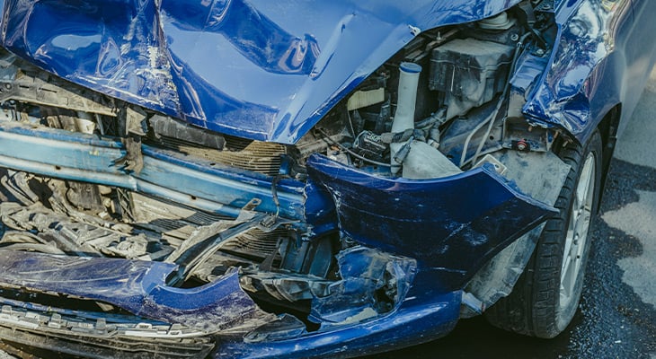Damaged blue car