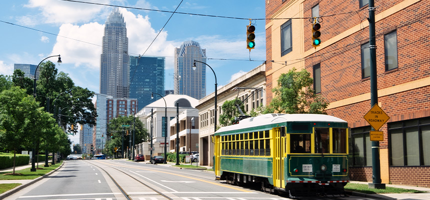 Street view of Charlotte urban area and green trolley