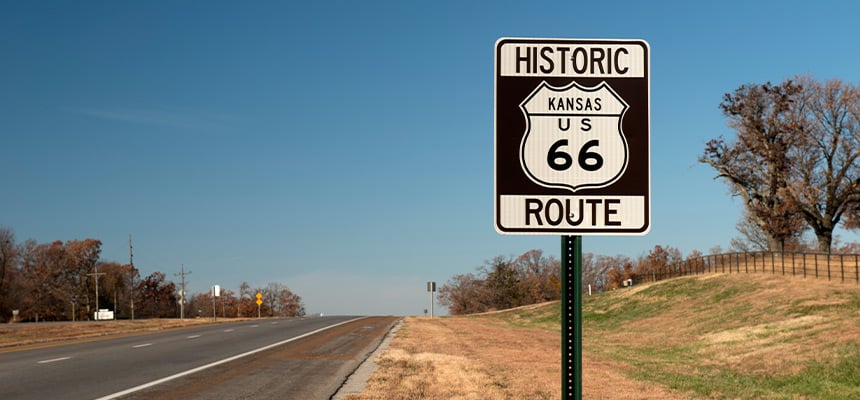 Kansas "Route 66" sign nearby a highway