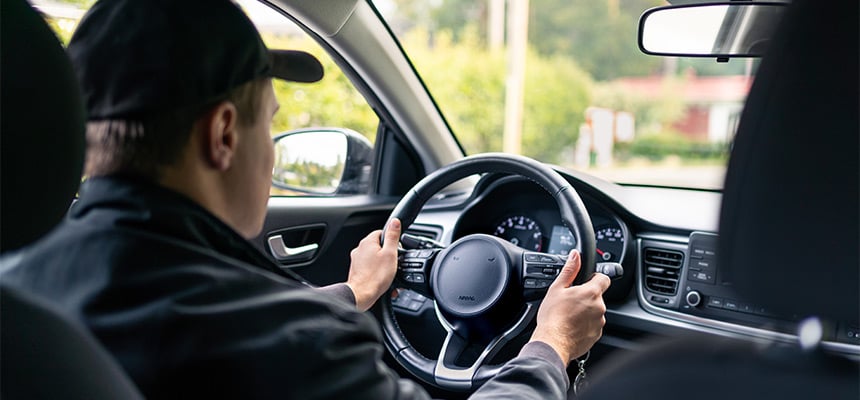 Uber driver behind the wheel