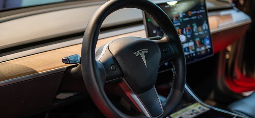 Closeup of a Tesla Model Y steering wheel